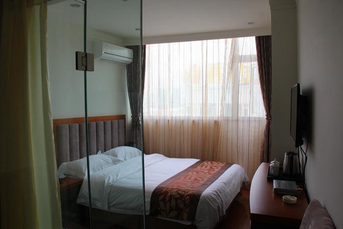 318 Express Motel Xichang Номер фото